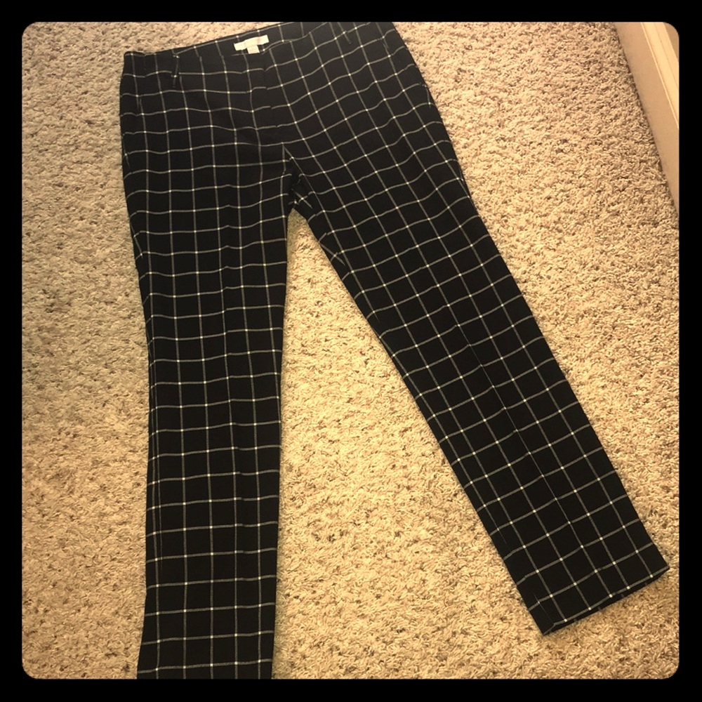 Ankle pants, black and grey with a little white.